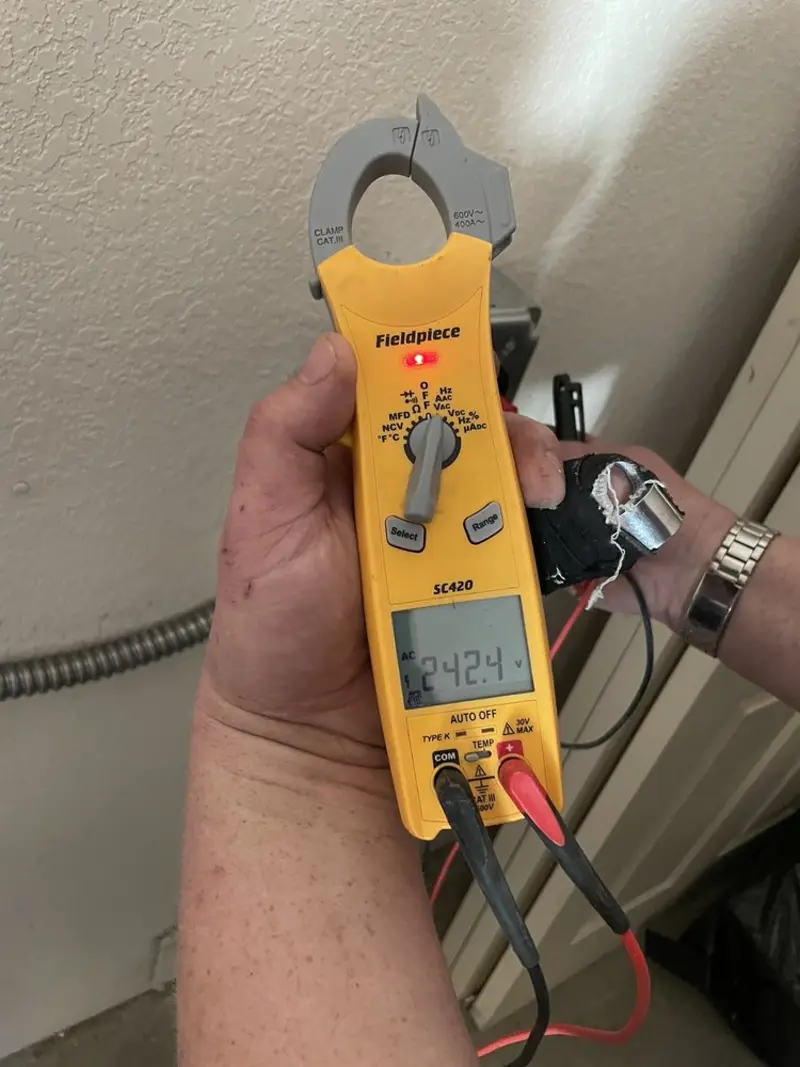 Voltage testing with clamp meter during Electrical Installation Services in Hermosa Beach